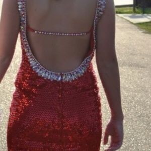 Short, sparkly red dress